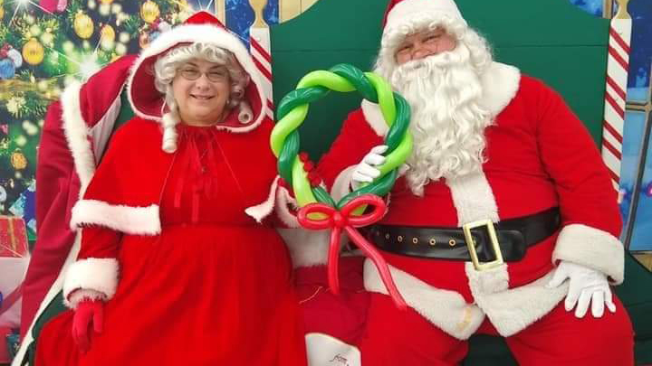 Nebraska's Jeanne Bonnett (left) entertains local youth as a clown and (during the holiday season) Mrs. Claus.