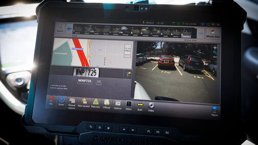 Close up of screen with different cameras monitoring areas on campus